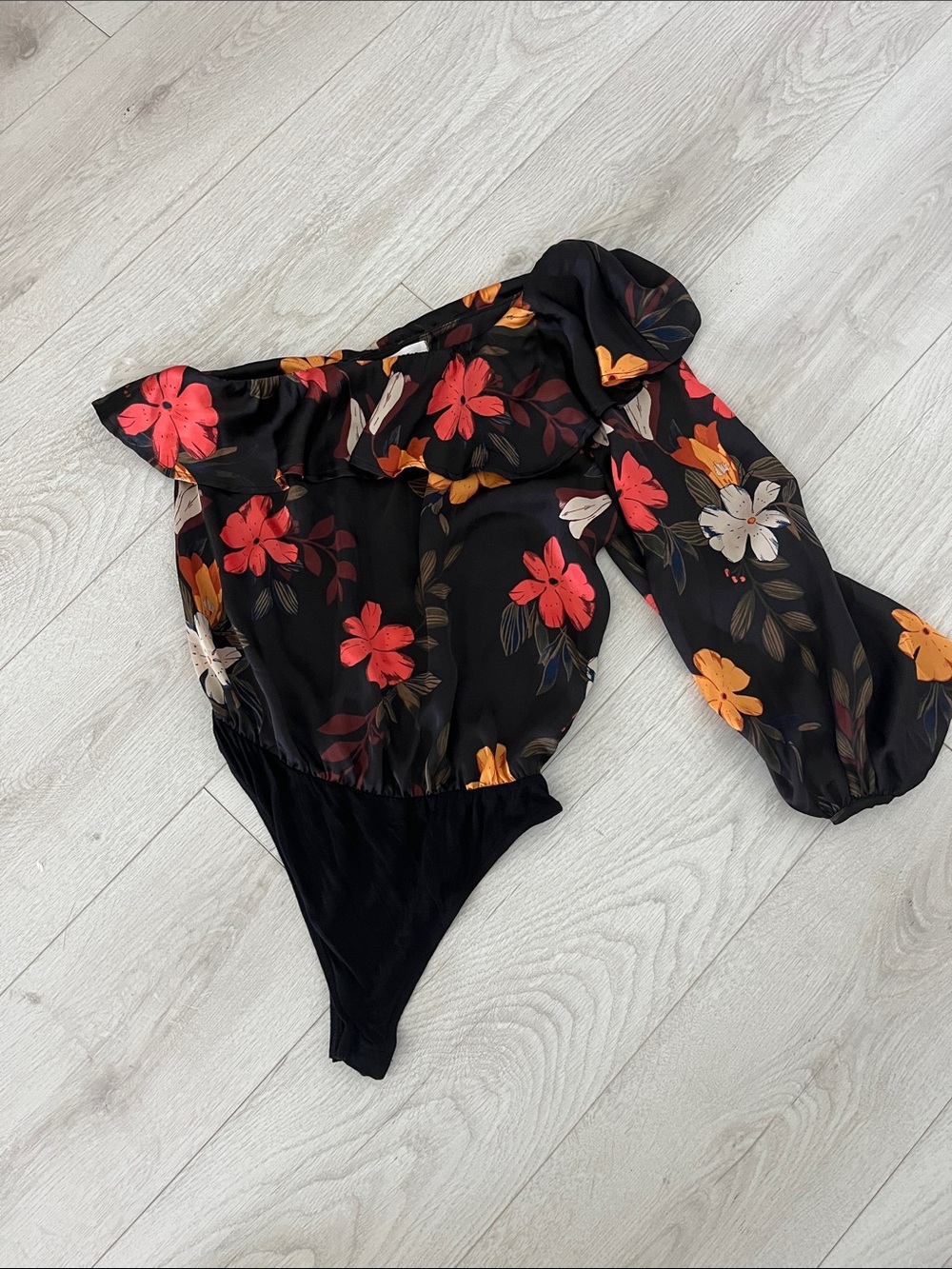 Lush One-Shoulder Floral Bodysuit in Black with Red, Orange & Cream Flowers